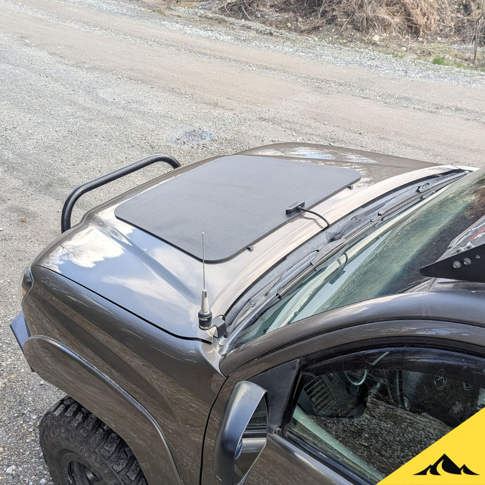 This is the VSS System 2.0 from Cascadia 4x4. This is a flexible 92 watt hood solar module/panel for the Toyota Tacoma 2nd gen. Green Tacoma camping